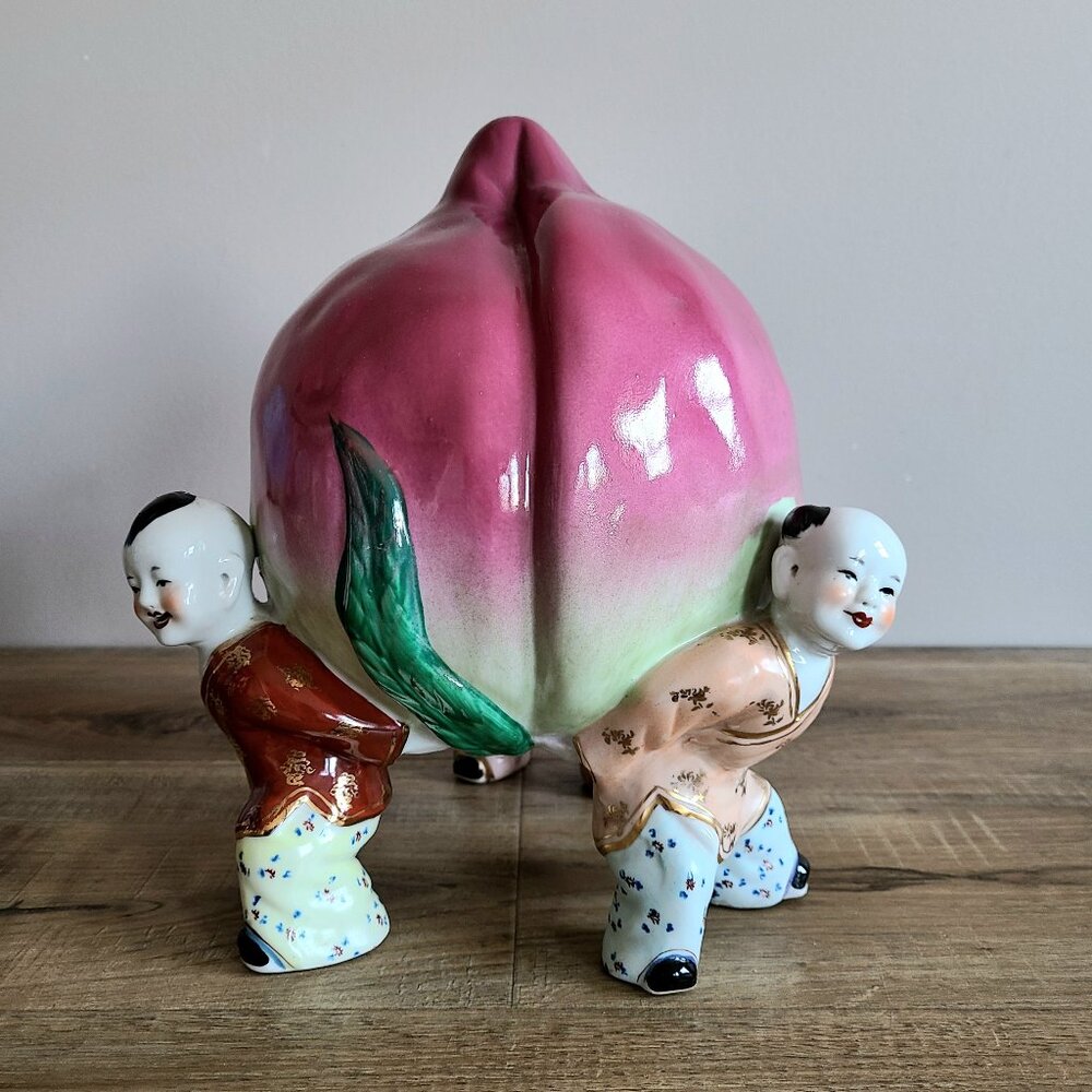 Vintage porcelain figurine. 3 Asian boys lifting Longevity Peach. 10.5'' tall.